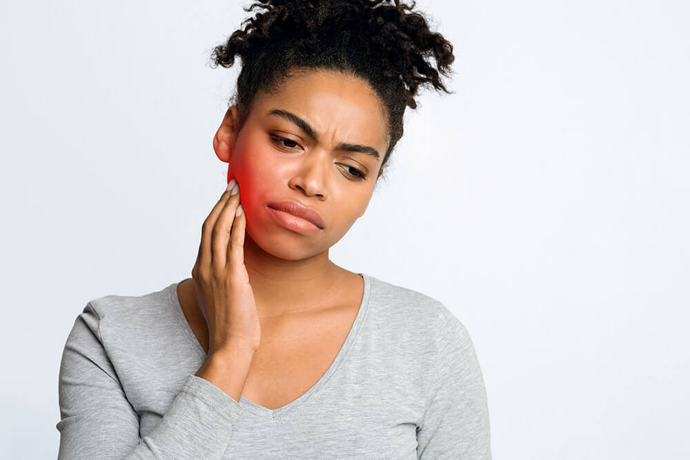 woman with jaw pain