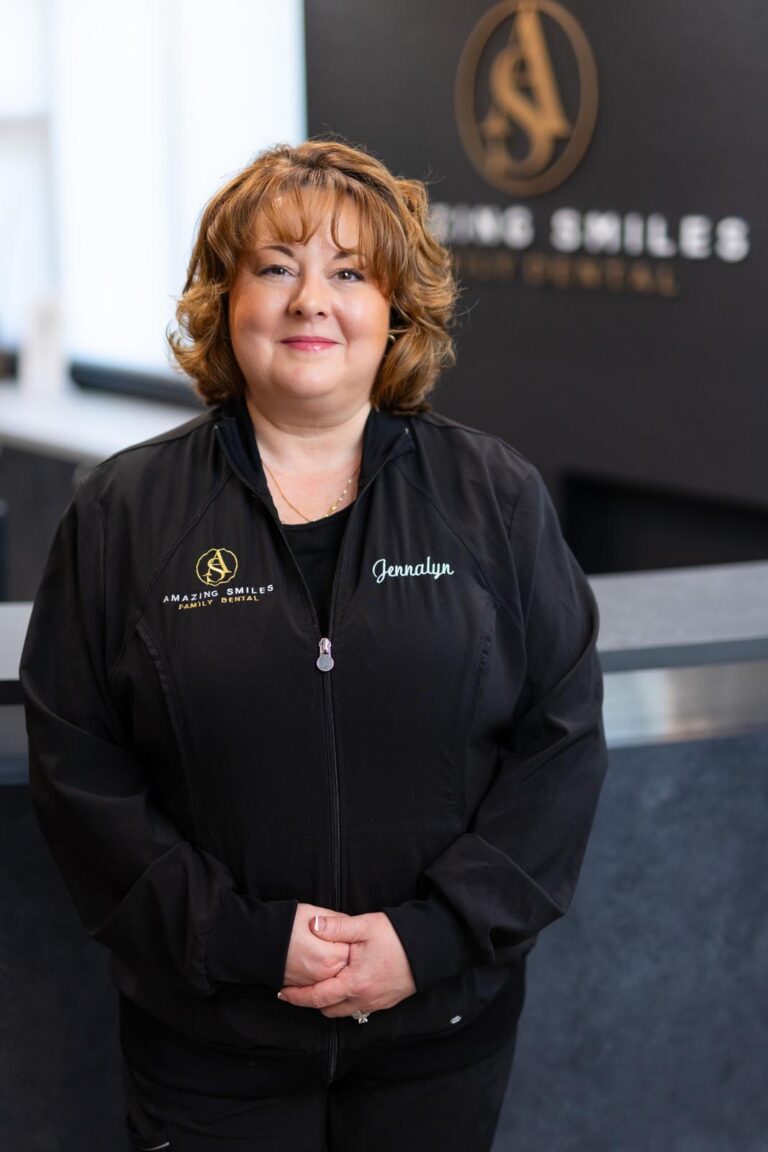 Jennalyn Operations Lead headshot at Amazing Smiles lobby. Smiling and wearing black scrub suitDr. Emily Hoang headshot at Amazing Smiles lobby. Smiling and wearing black scrub suit